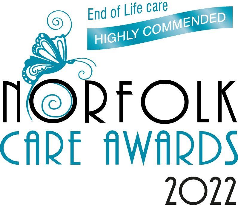 A logo for norfolk care awards 2022 with a butterfly on it