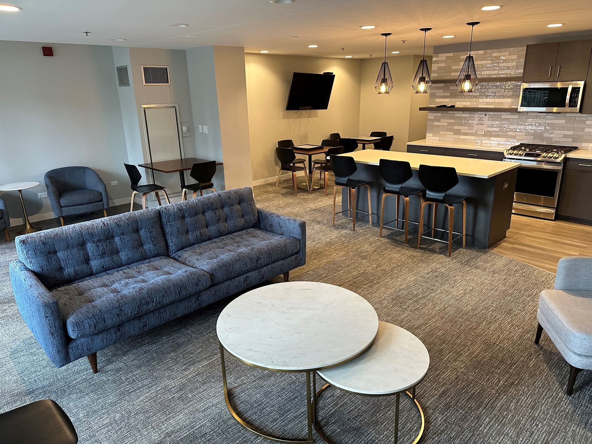 A bathroom with a walk in shower , toilet , sink and bathtub.