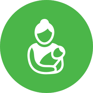 A woman is holding a baby in her arms in a green circle.