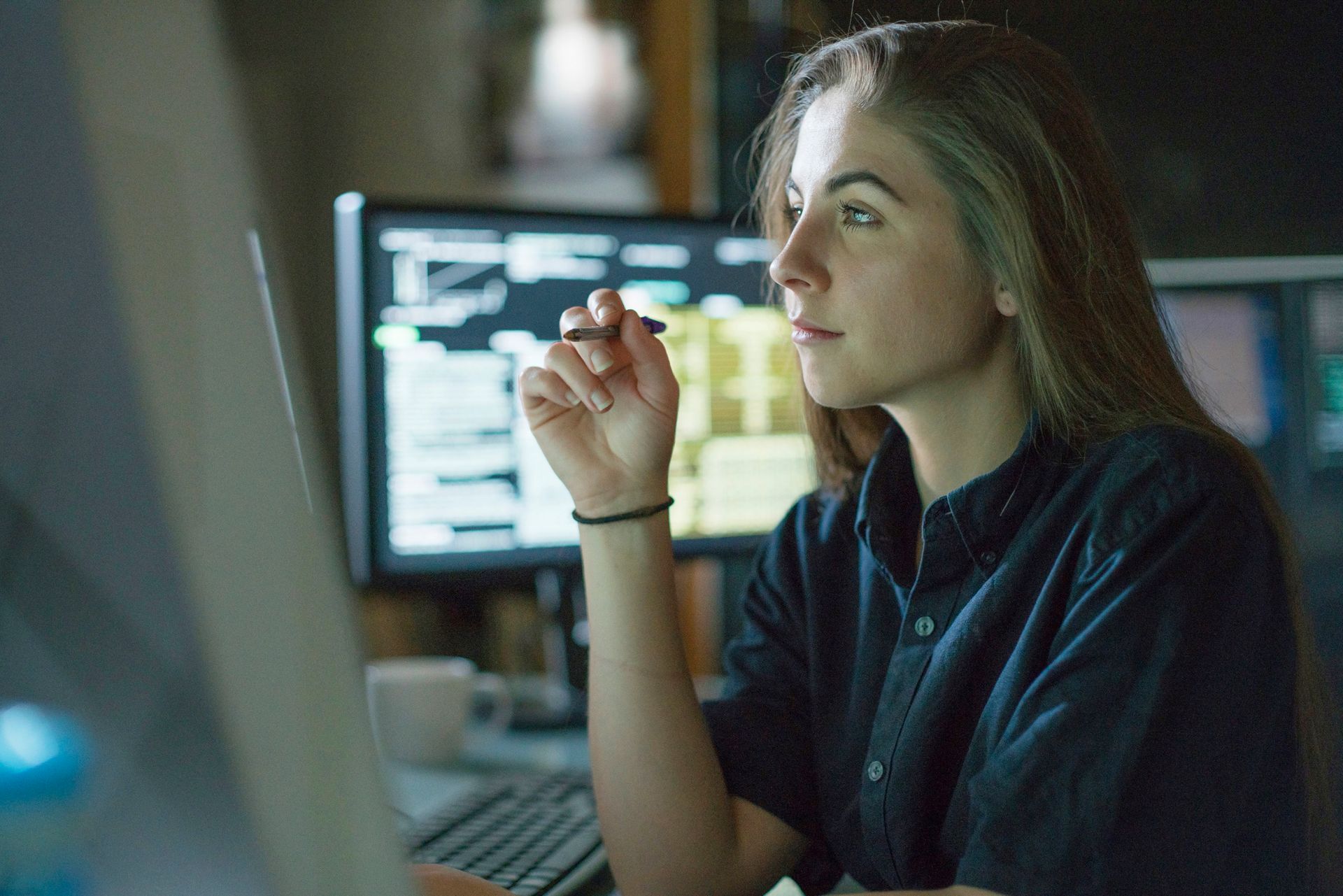 student working on a computer in the computer lab