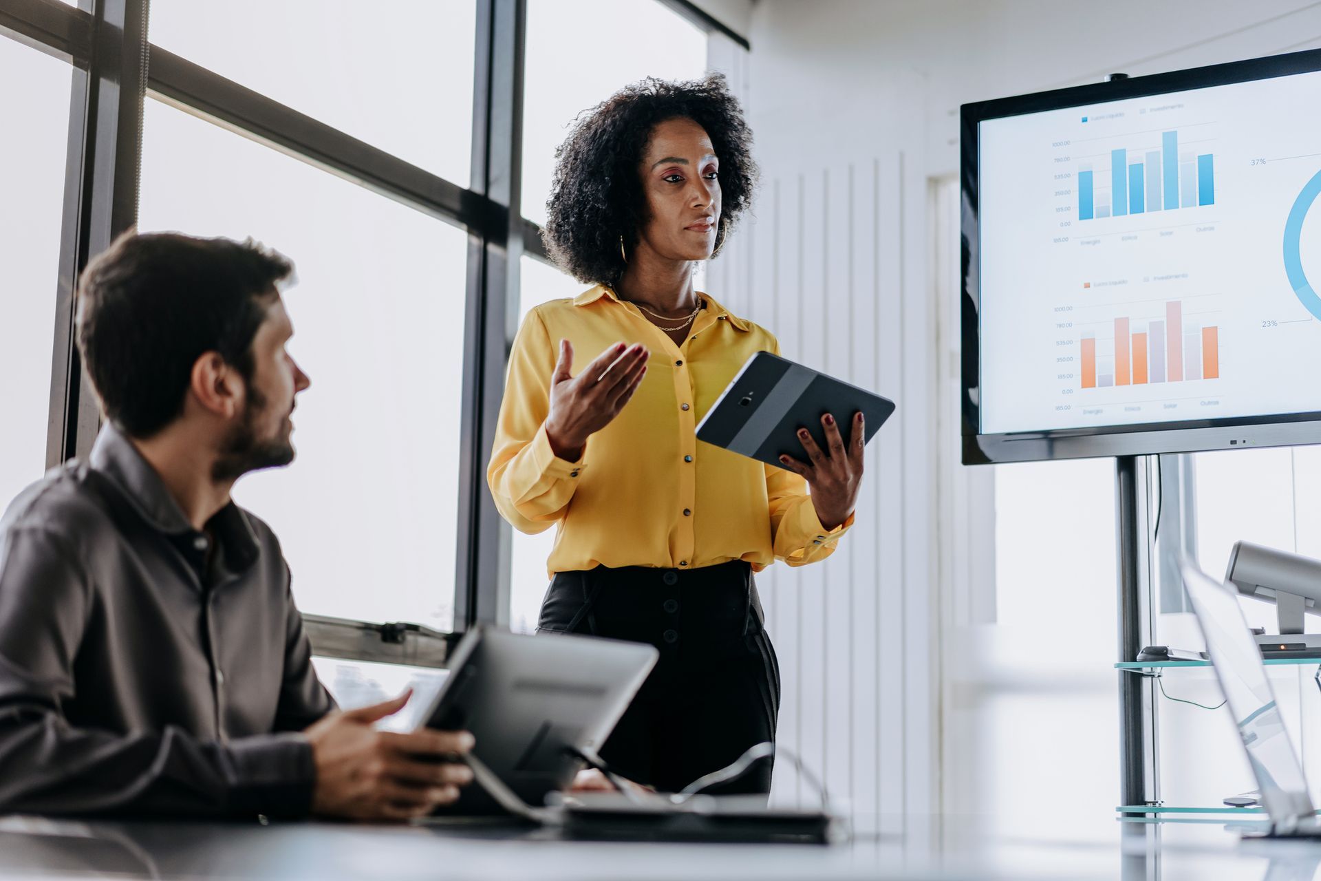 paralegals looking at data in a conference room