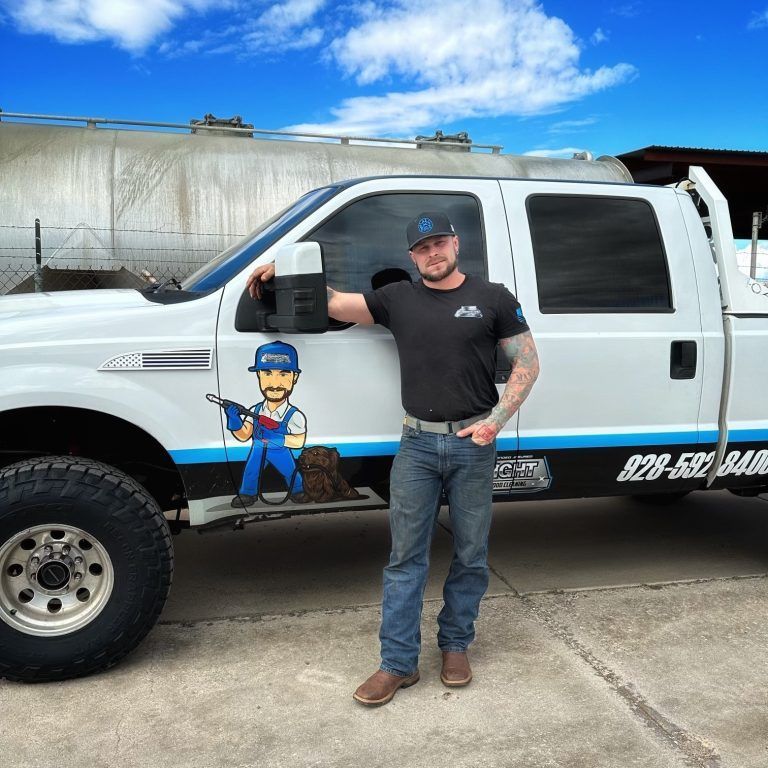 White Pickup Truck Parked in Front of a Building