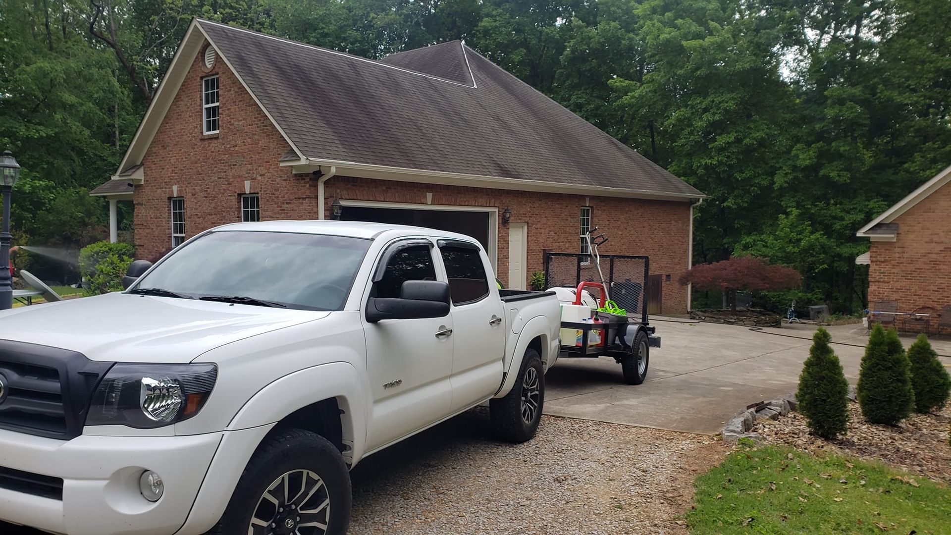 Before Soft Wash Roof Brick House, With White Truck Infront | Harvest, AL | Radiant Exterior Cleaning