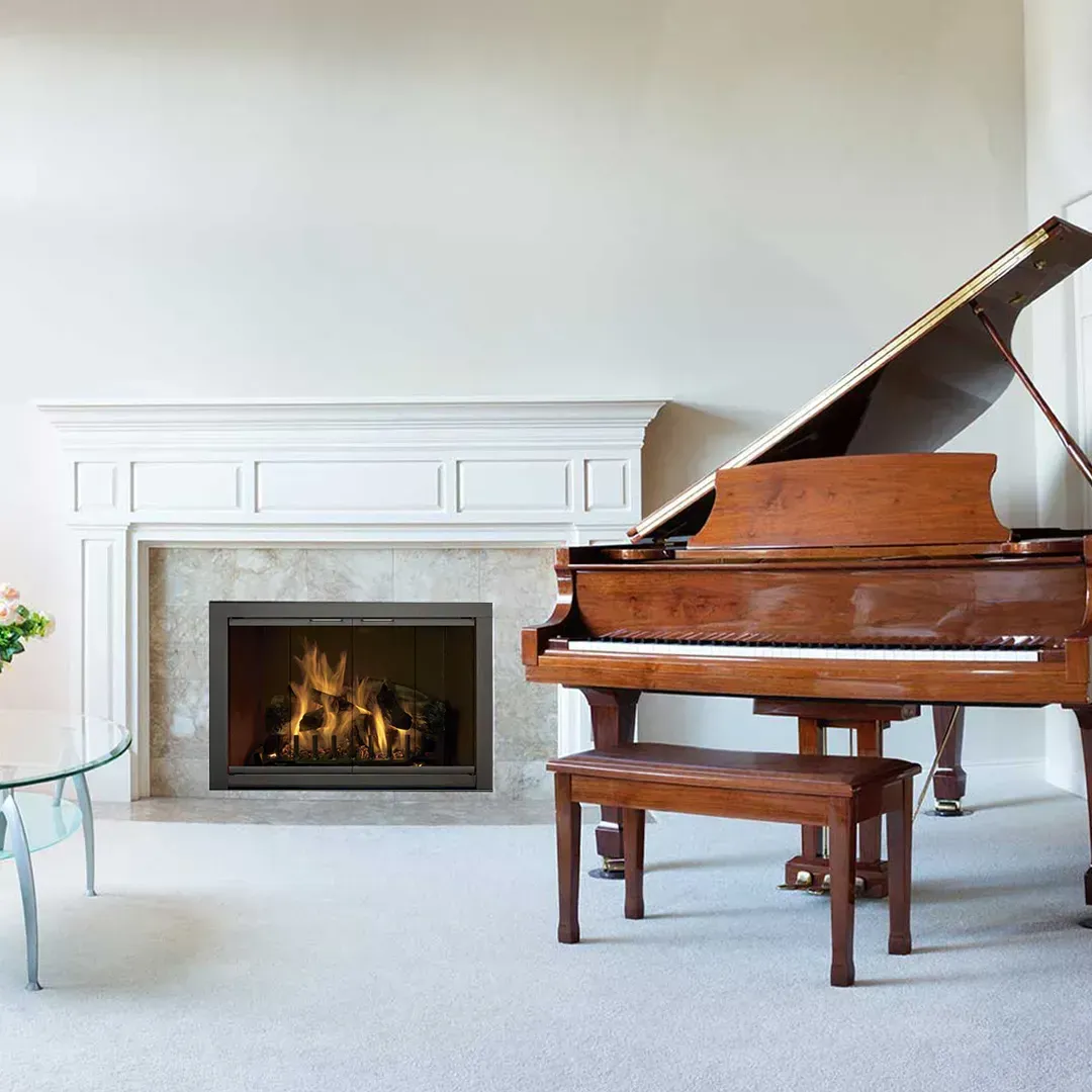 Fireplace with a burning fire, and a grand piano in a living room with white walls and carpet.