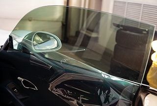 Installing the Car Glass — Long Beach, CA — Glass-Man Glass Company