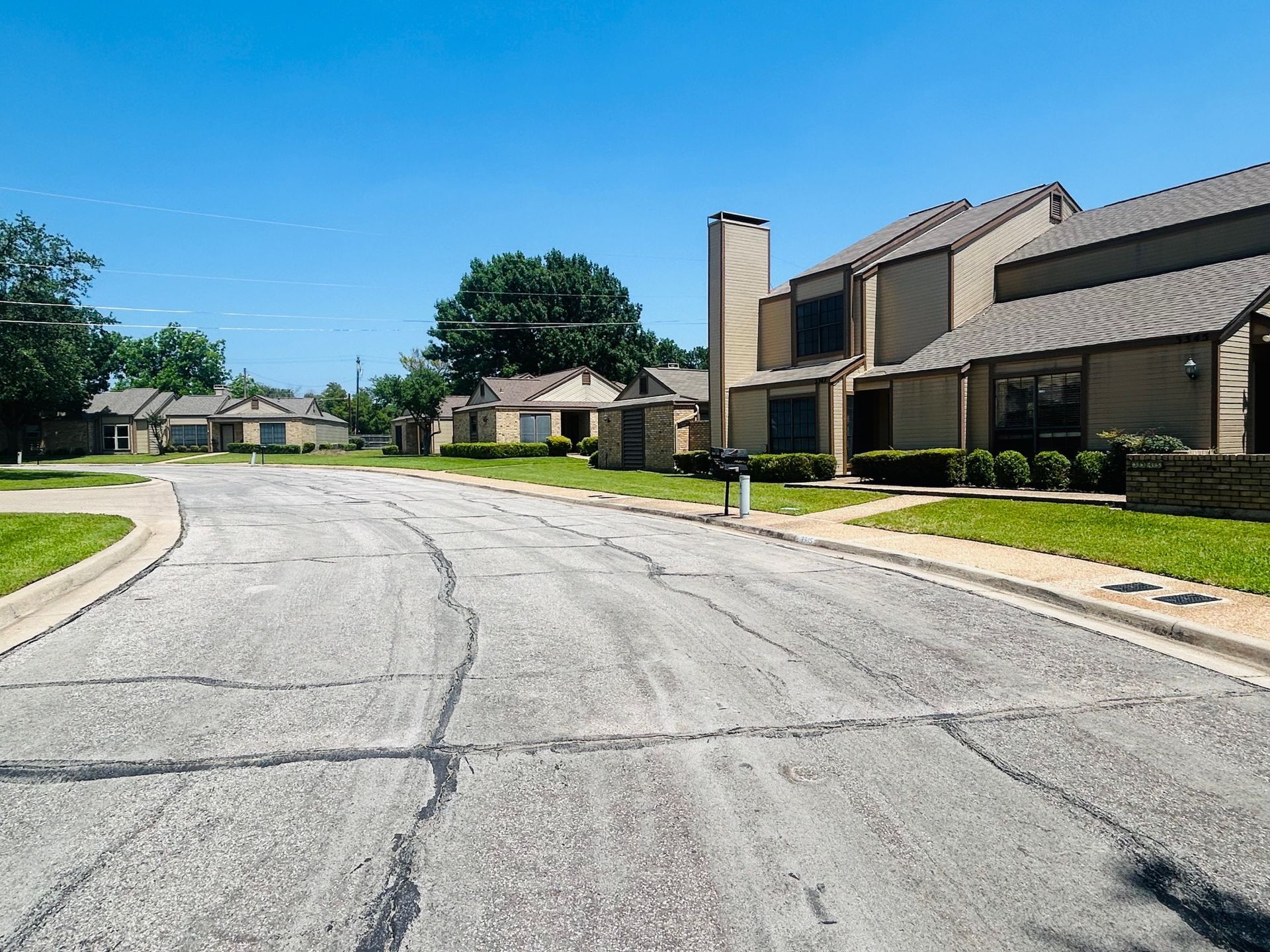 A residential street with a lot of houses on it