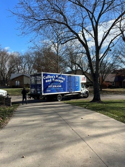 Movers Unpacking Boxes from Truck - Coffee's Moving and Storage in Dayton, OH