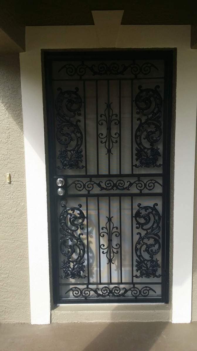 Door with black railing—Railing in Tampa, FL