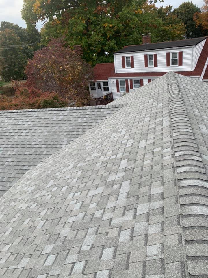 The roof of a house with a lot of shingles on it.
