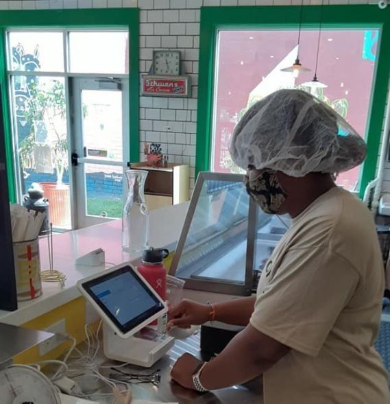 Working on Cash Register — Omaha, NE — A Taste of New Orleans