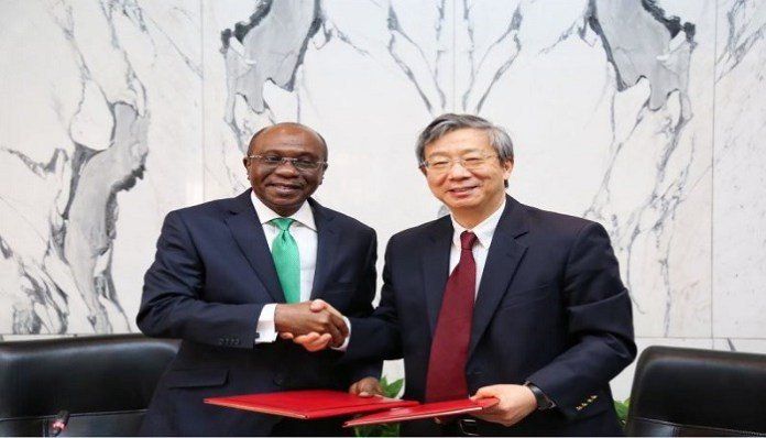 Currency swap: Governor Godwin Emefiele of the CBN and Governor Yi Gang of the People’s Bank of China