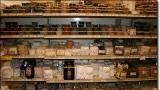 A grocery store shelf filled with lots of food items