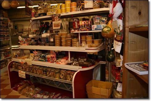A store filled with lots of items including candy