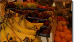 A bunch of bananas sitting on top of each other