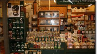 A store with a sign that says proud serving green beans