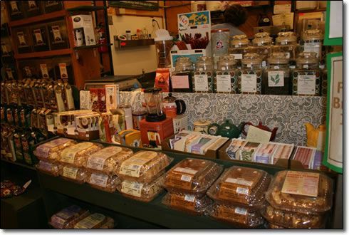 A store filled with lots of food including bread