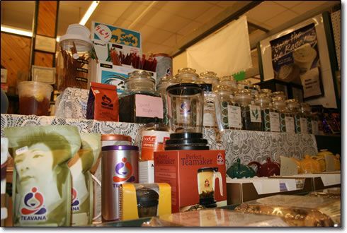 A blender is on a table in a store
