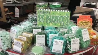 A display of candy for st. patrick 's day in a store.