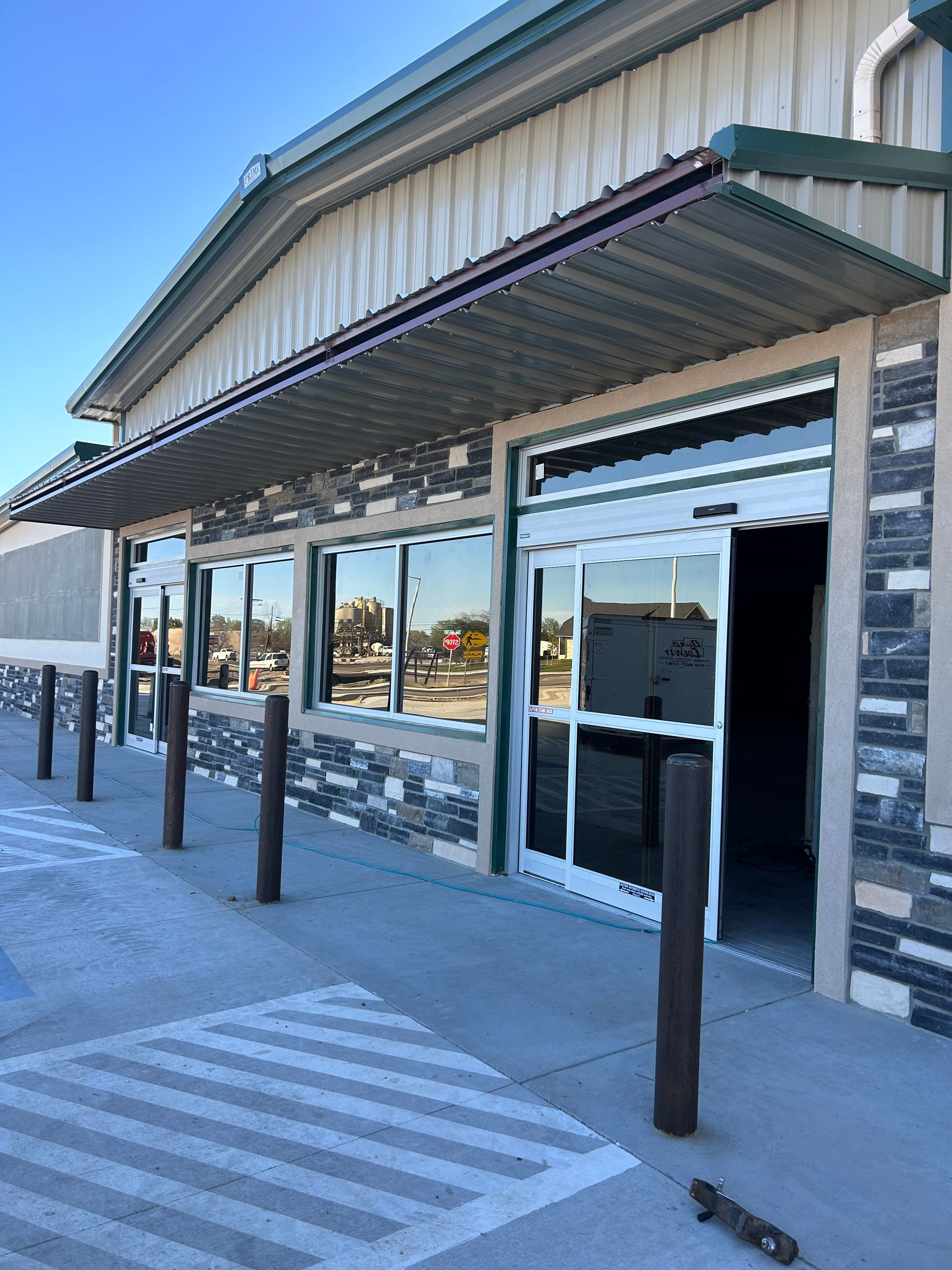 A large building with a canopy over the entrance