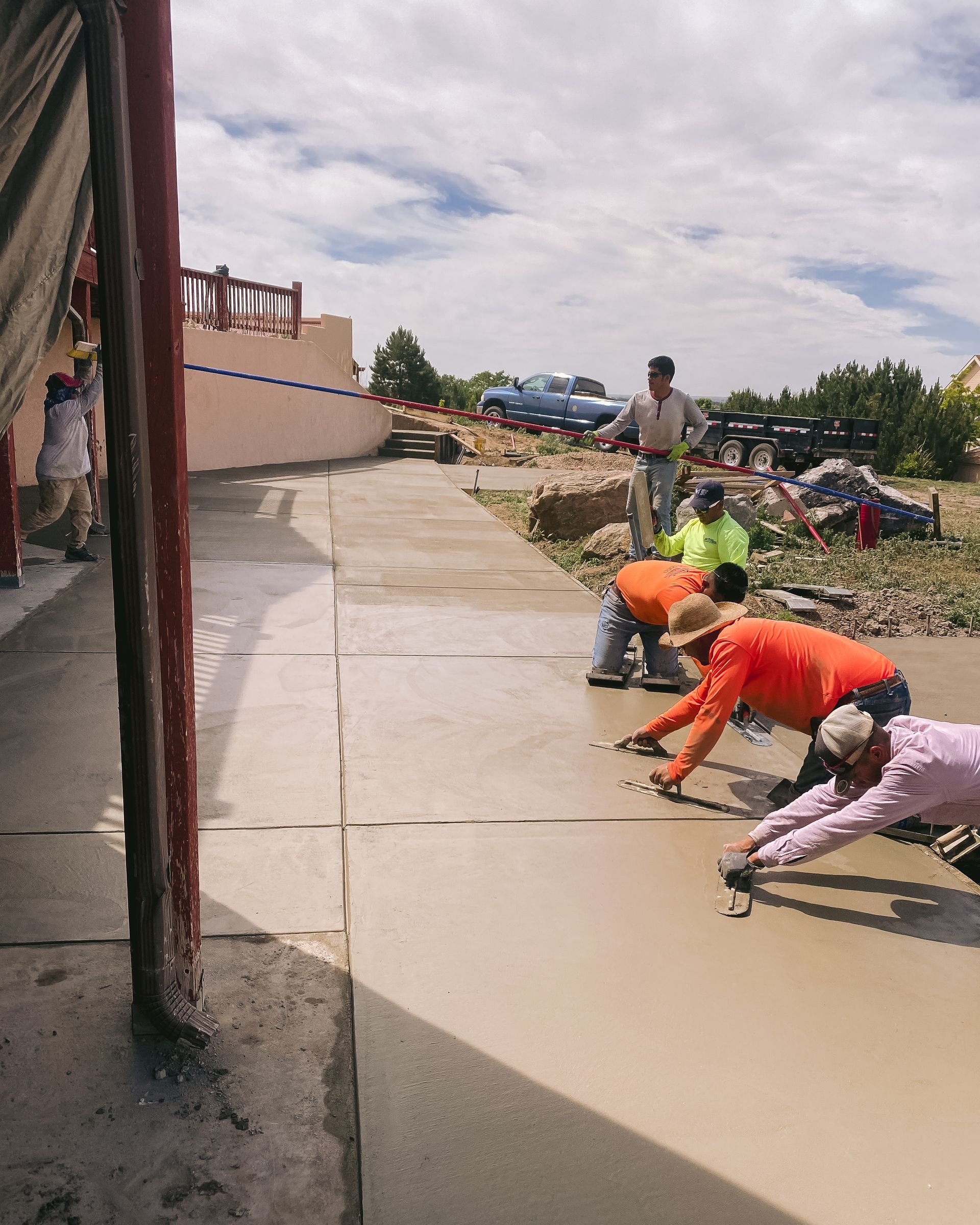 guys finishing concrete