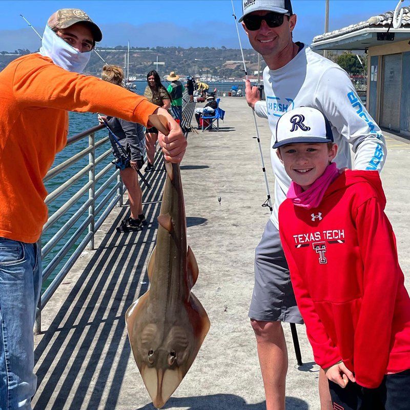 Man Carrying a Big Fish — San Diego, CA — SoCal Eco Tours