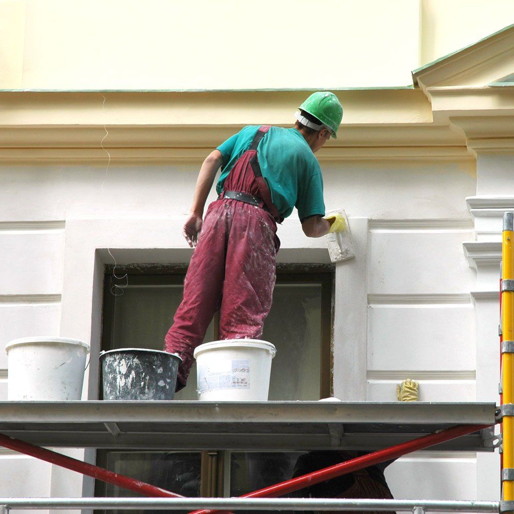 Man Painting Walls Outside — Athens, GA — Paco’s Painting, LLC