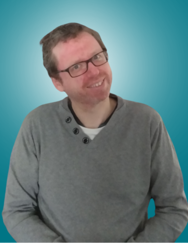 A woman in a white shirt is smiling for the camera against a blue background.