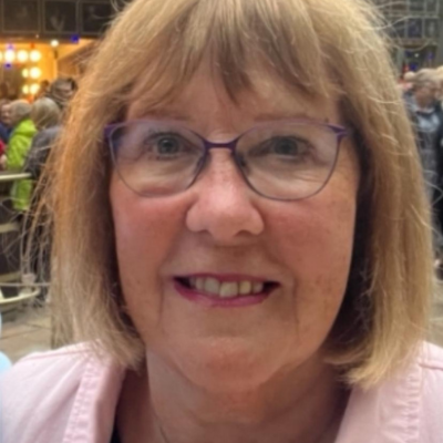 Photo of Hope Volunteer Ambassador Anne Goadby smiling into the camera