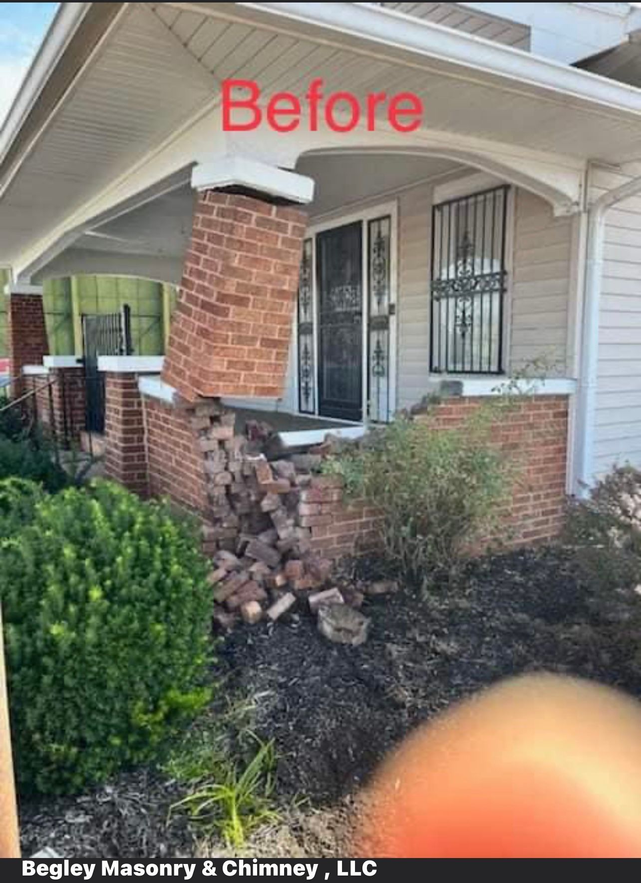 A before picture of a house with a brick chimney.