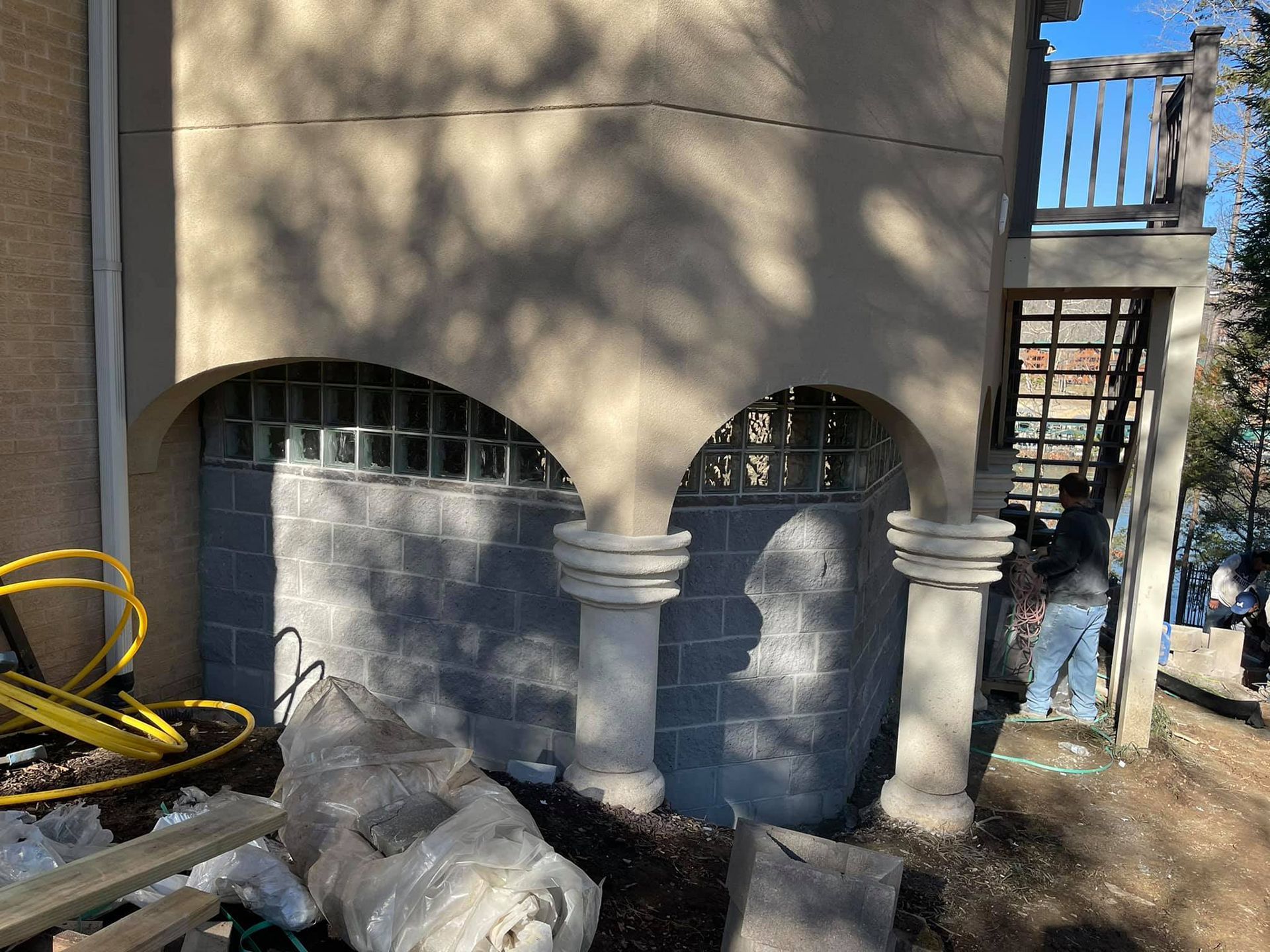 A building with a bunch of bags on the ground in front of it
