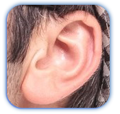 A close up of a person 's ear with a scarf around it.