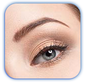 A close up of a woman 's eye with makeup on.