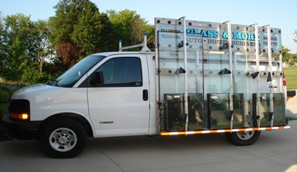 White Car With A Company Banner — Belleville, IL — Glass & More Inc.