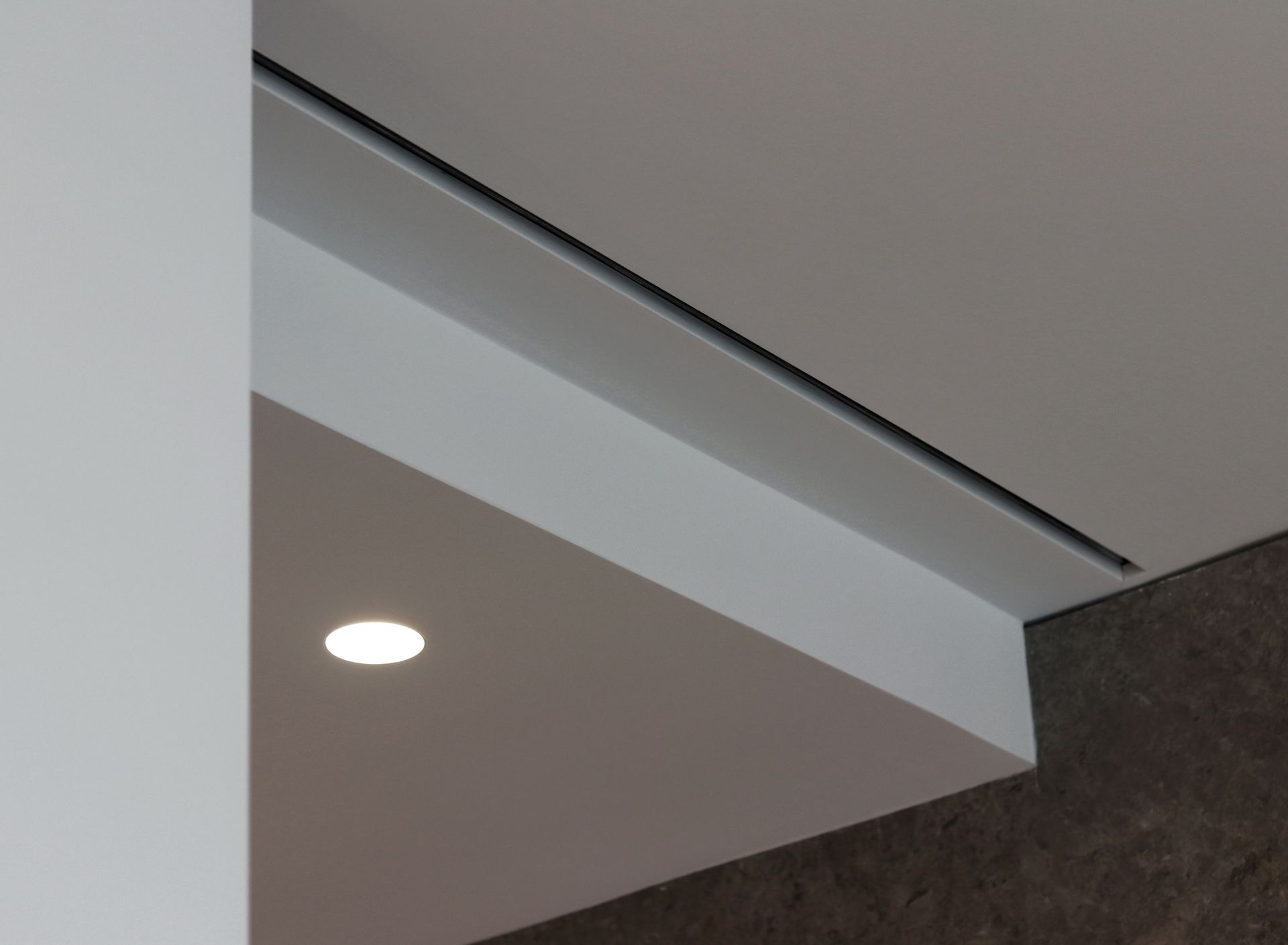 a white ceiling with a light on it