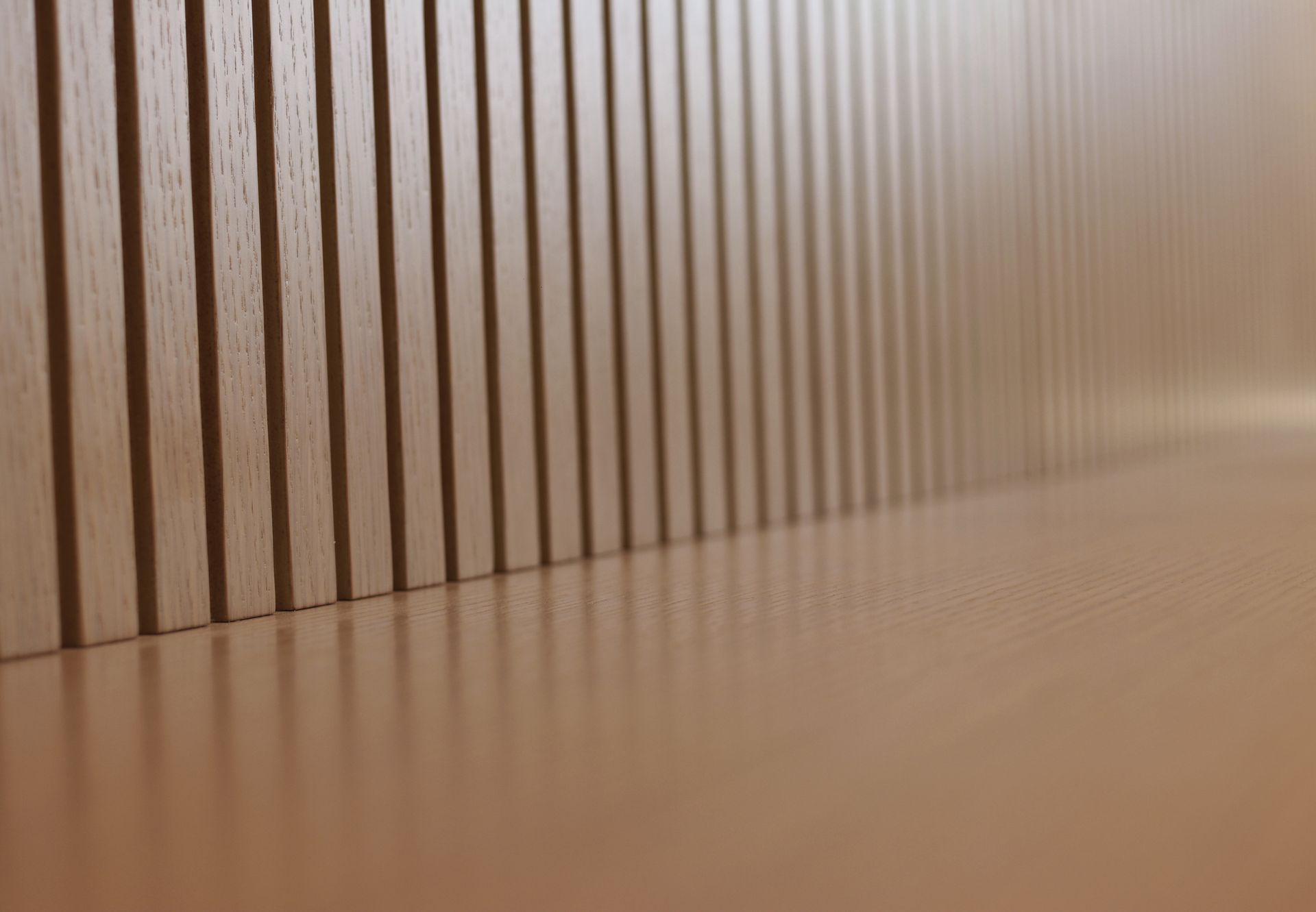 a room with a wooden wall and a wooden floor .