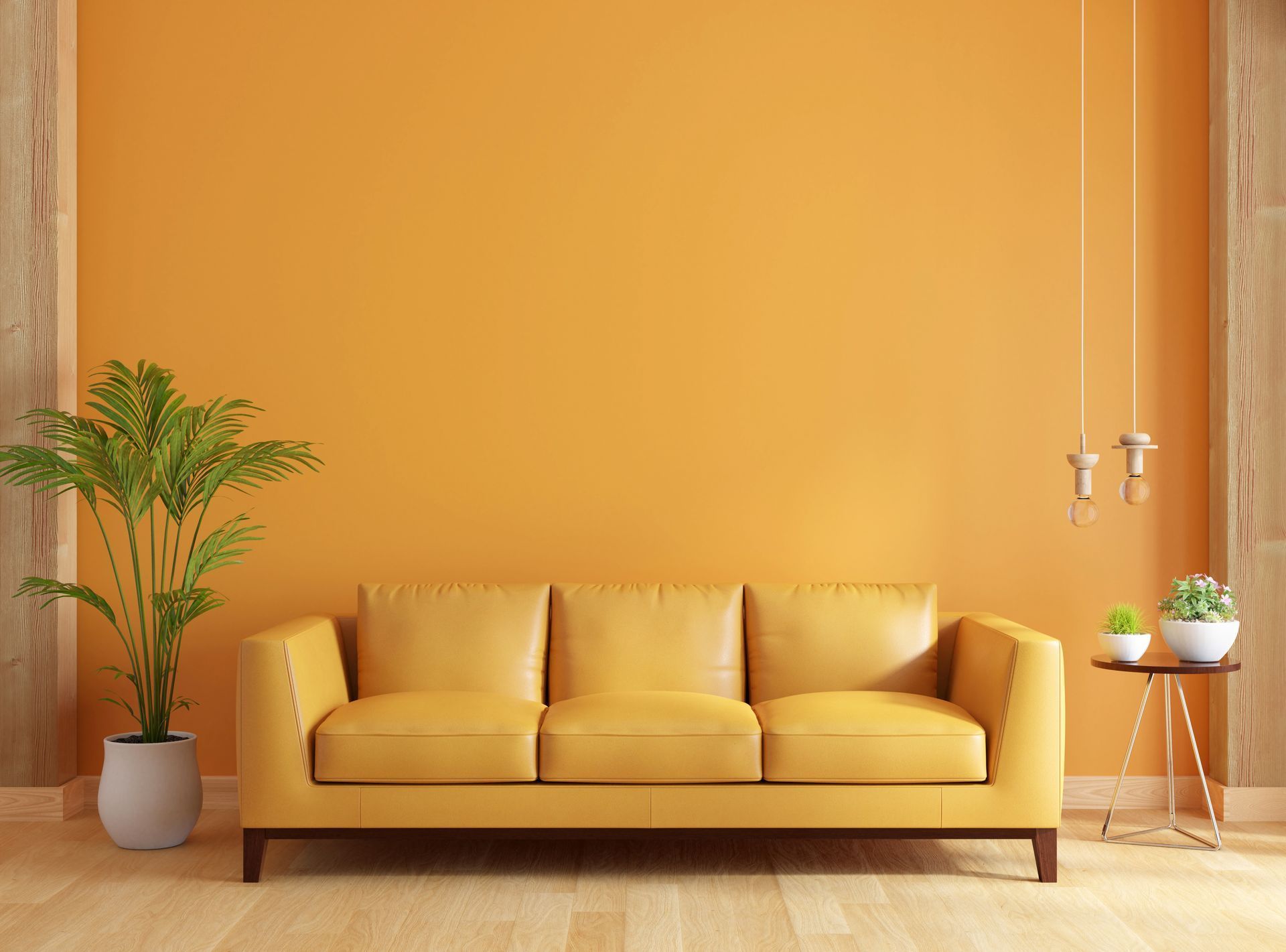 there is a yellow couch in the living room with orange walls .
