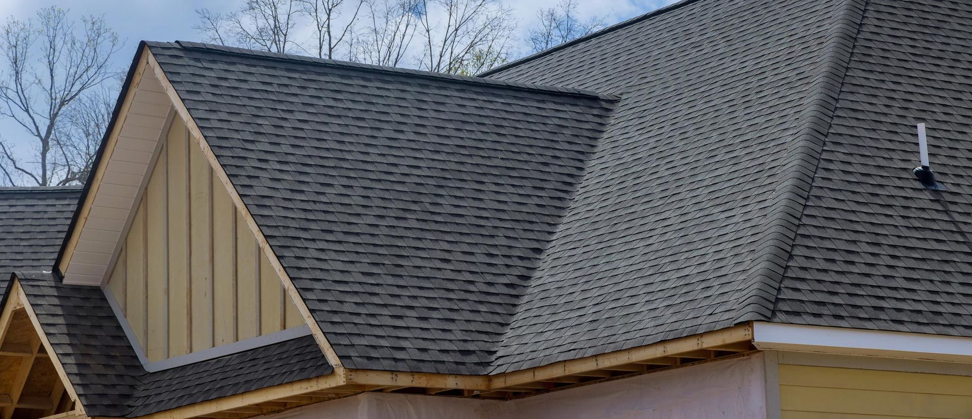 A close up of a roof of a house under construction.