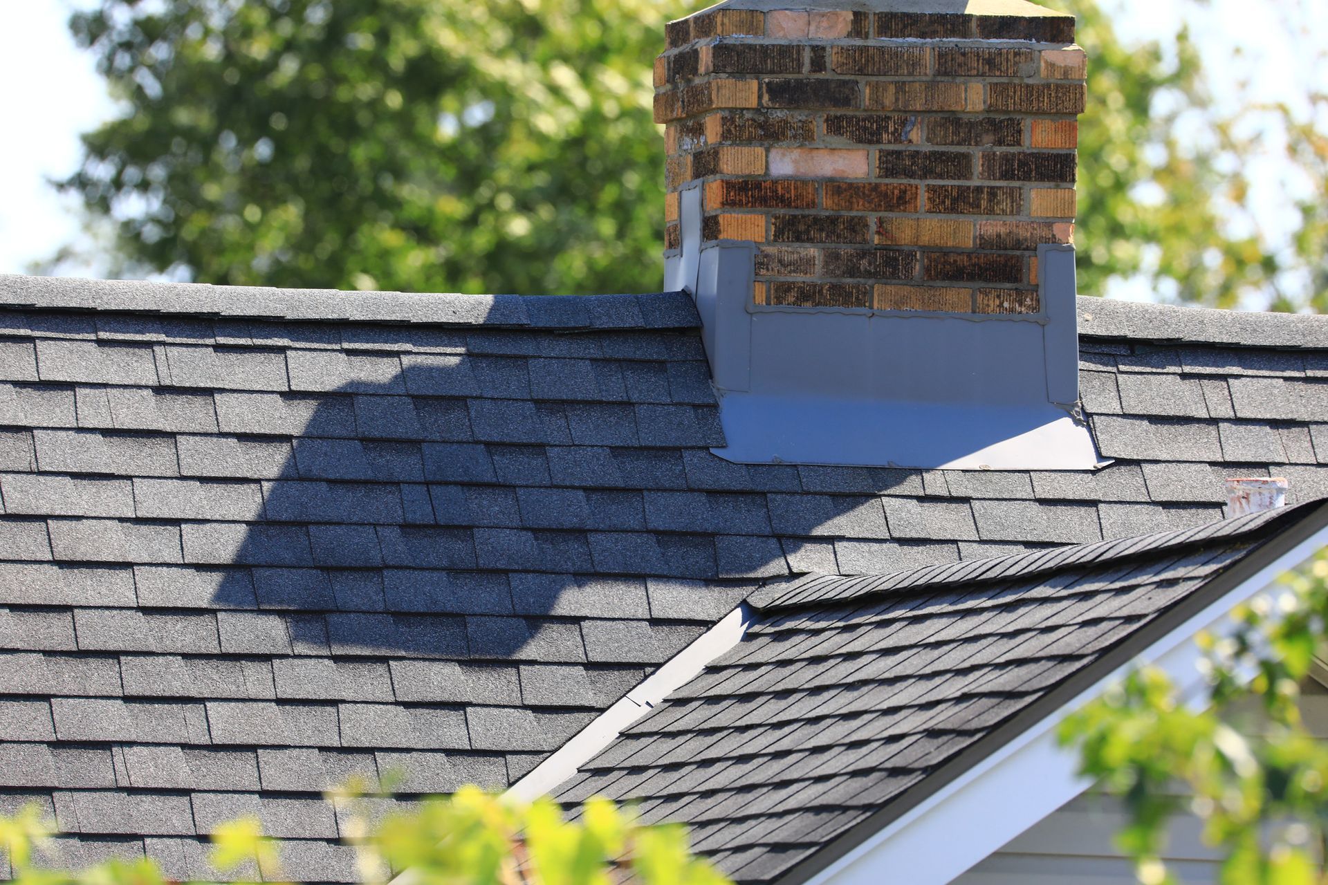 A roof with a chimney on top of it