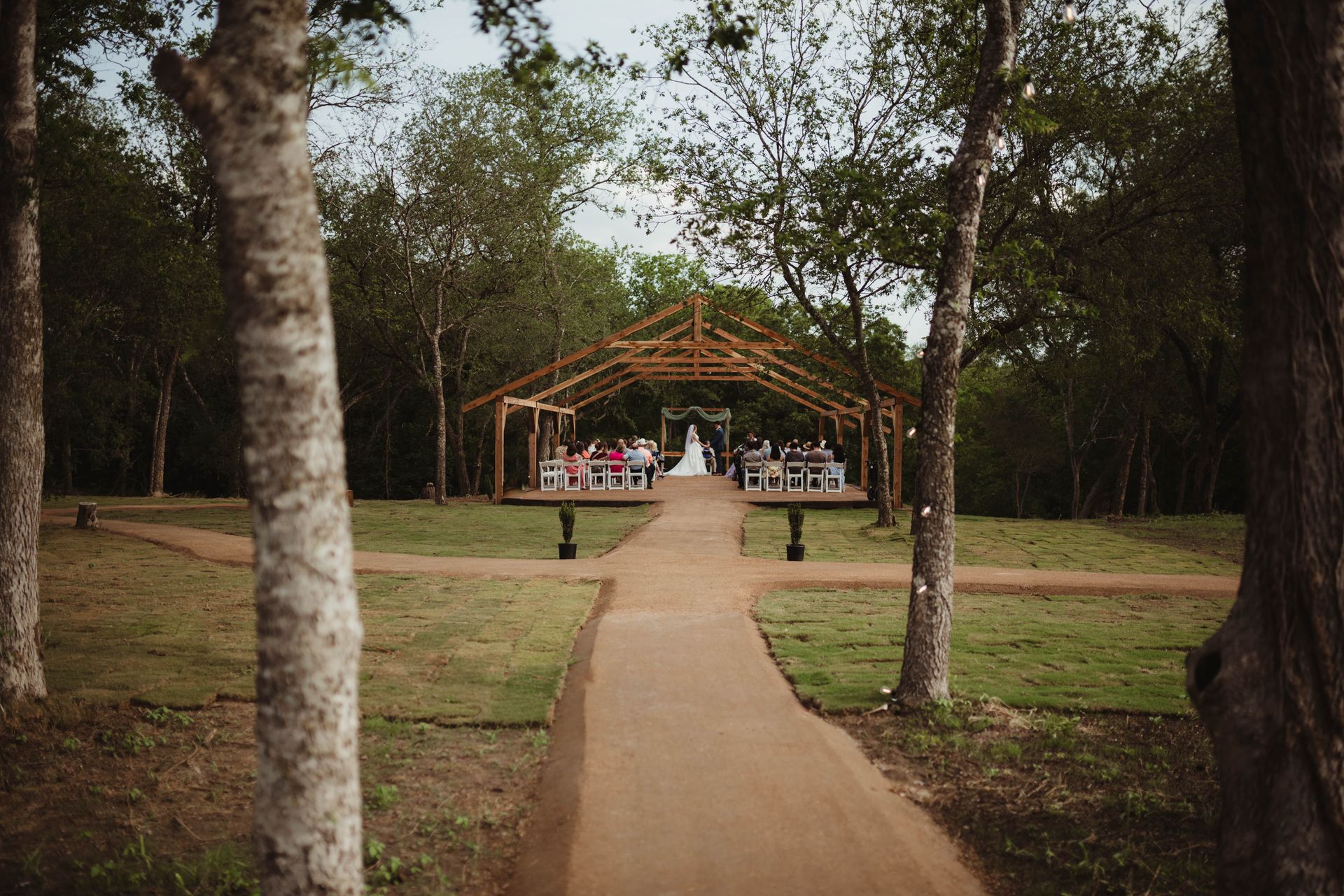 Sunset behind tipi wedding venue in Texas