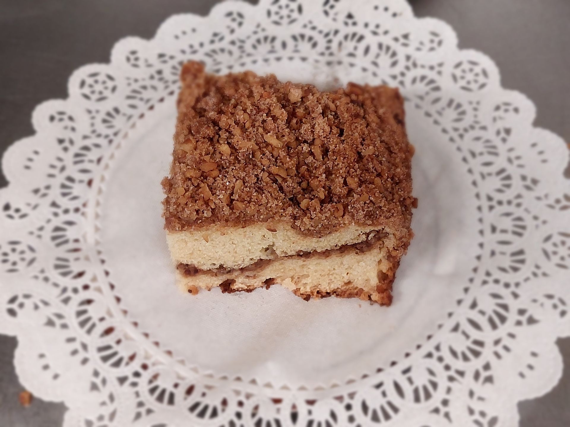 A piece of cake is on a white plate