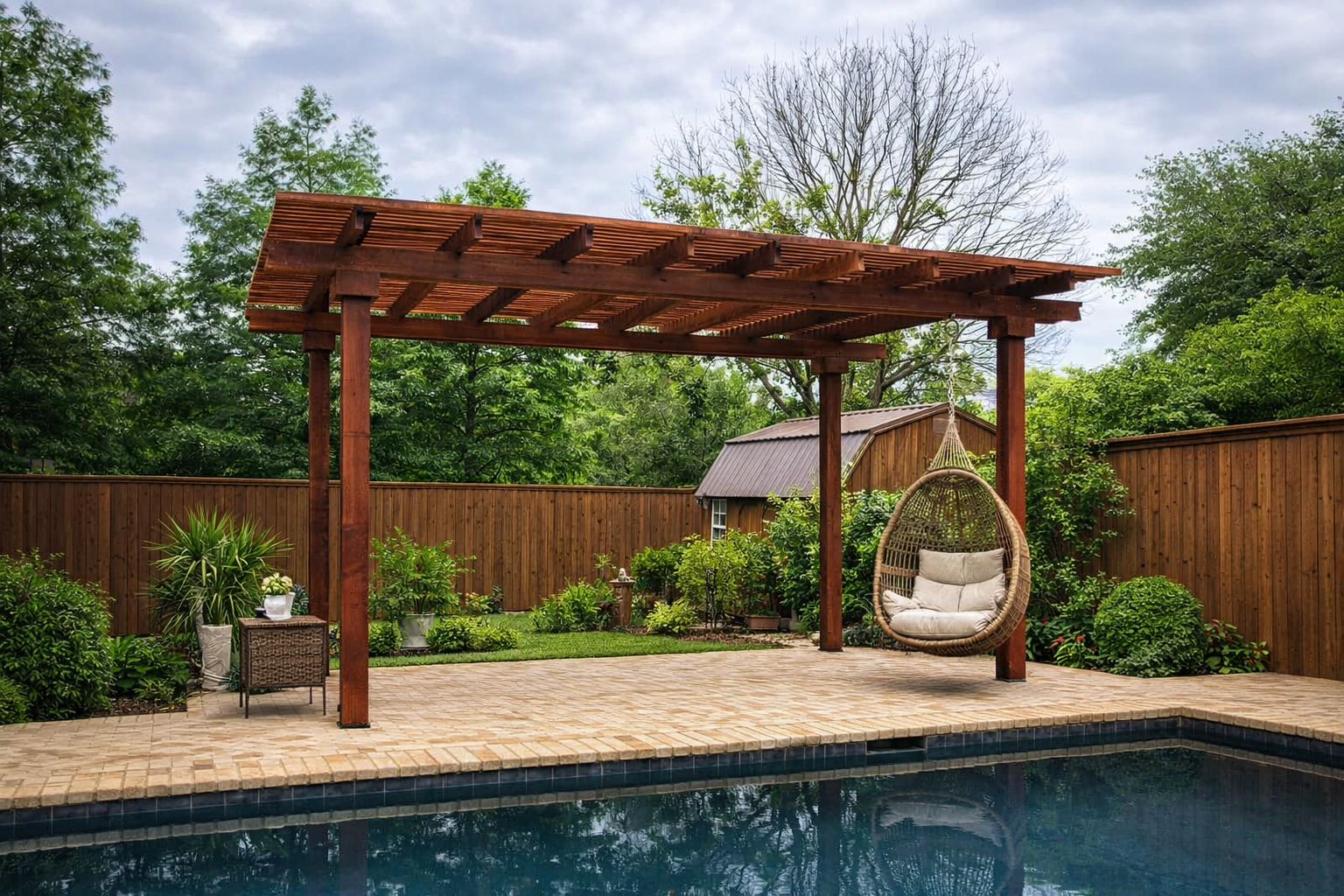 Backyard with green lawn, stone patio, brick house, and pergola under a sunny sky. Backyard with green lawn, stone patio, brick house, and pergola under a sunny sky.