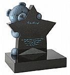 bear standing behind a star-shaped memorial