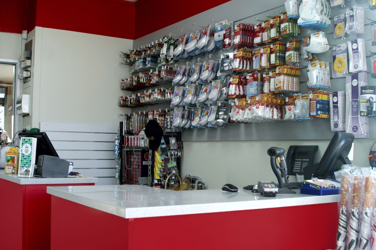 Arthur Burkes, shop counter, front desk, display case,  shelving, new,  bespoke, joinery, space, doors,  modern, colour, branding, professional, hanging, products