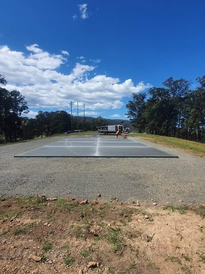 A Concrete is Being Built in the Middle of a Gravel Road — MidCoast Concreting in Bulahdelah, NSW