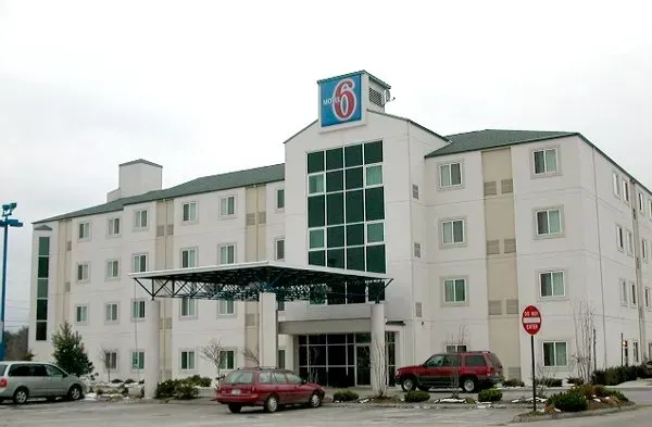 A large white building with the number 6 on it.