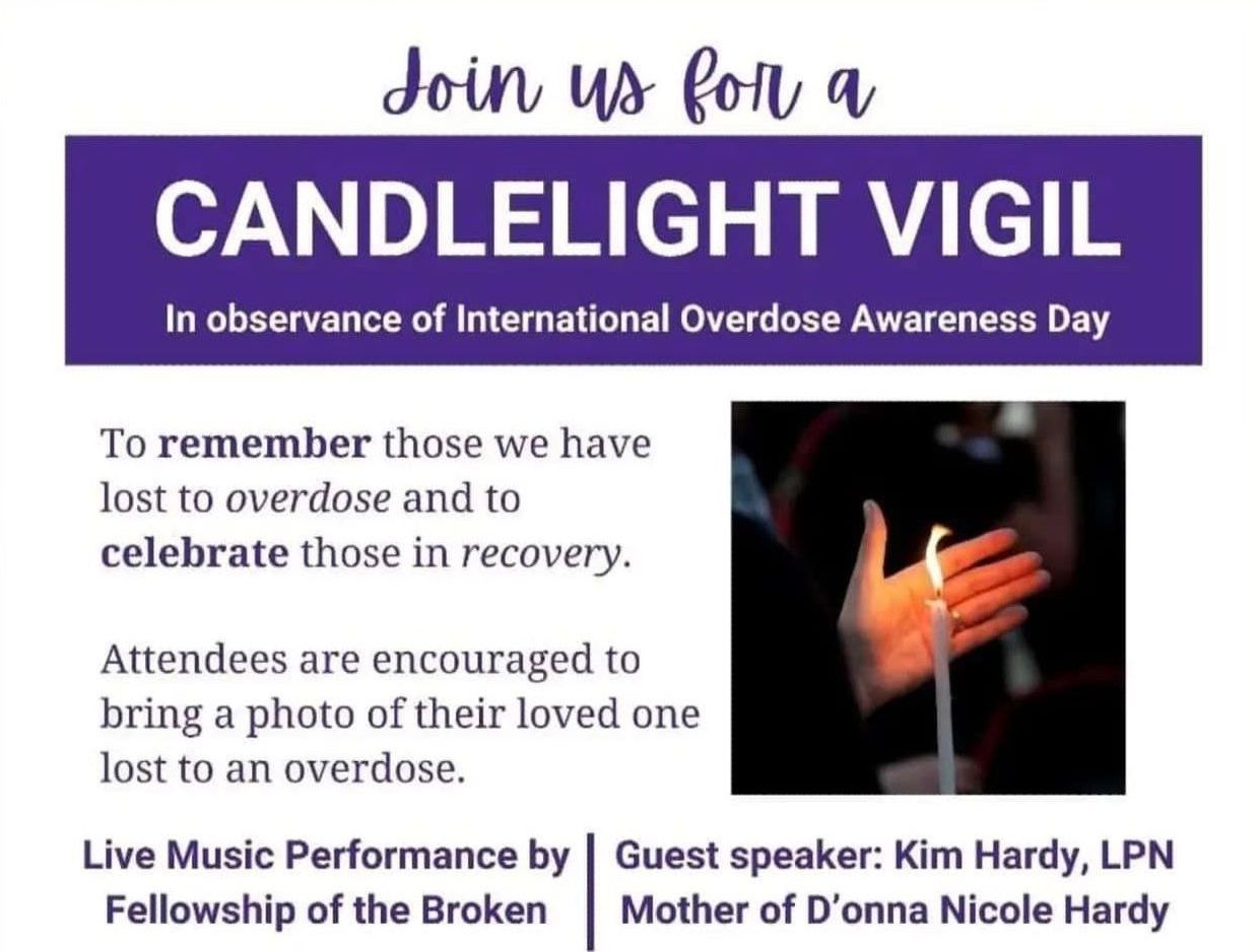 An advertisement for a candlelight vigil in observance of international overdose awareness day