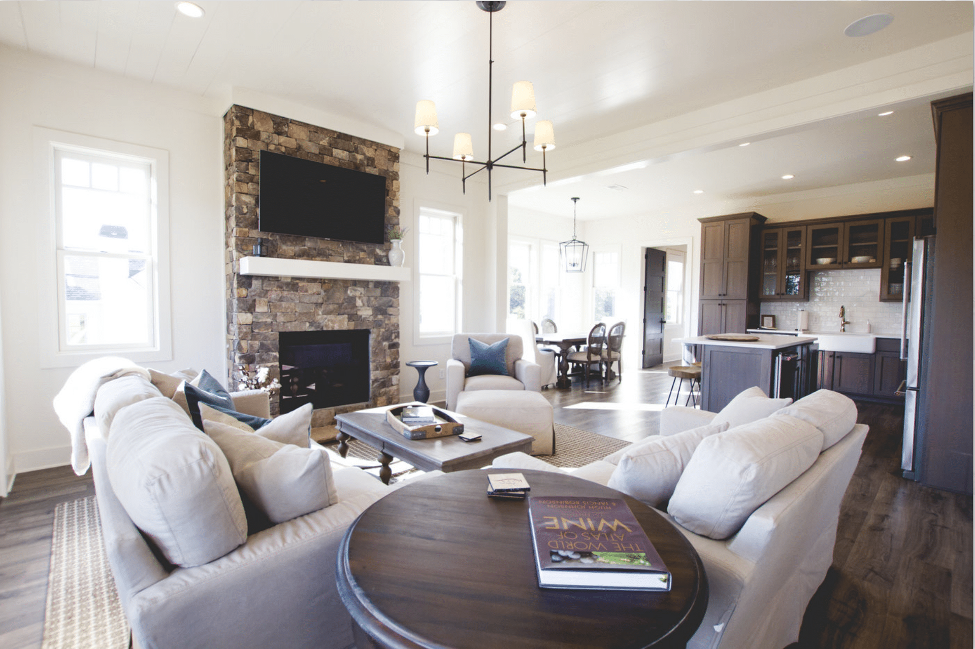 A living room filled with furniture and a fireplace.