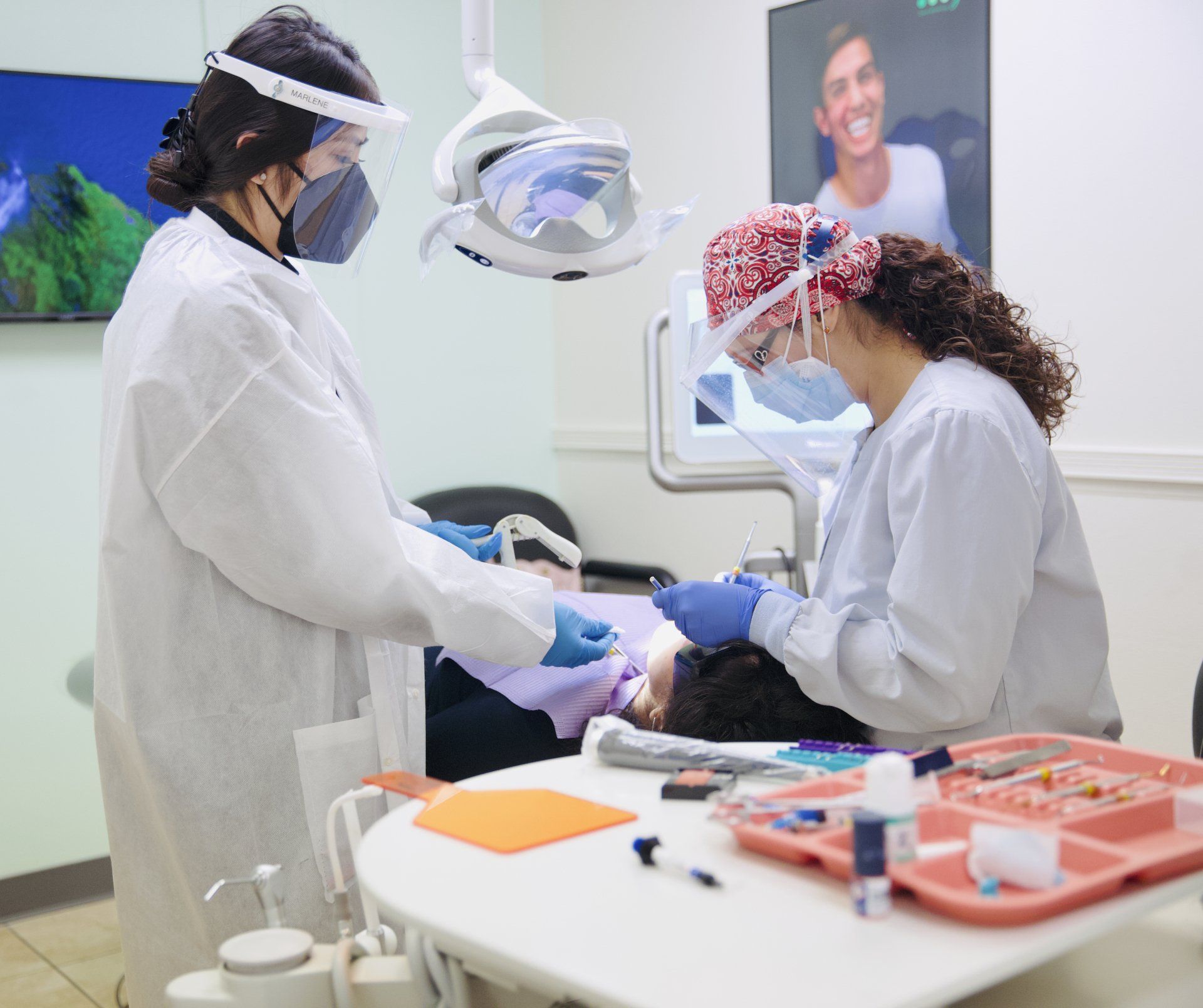 Dr. Jacquelyn Checking Her Patient's Teeth Condition