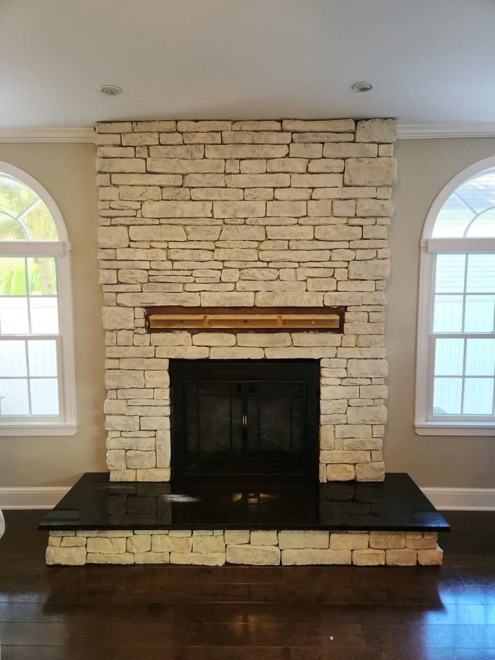 paint a brick fireplace to update your outdated look