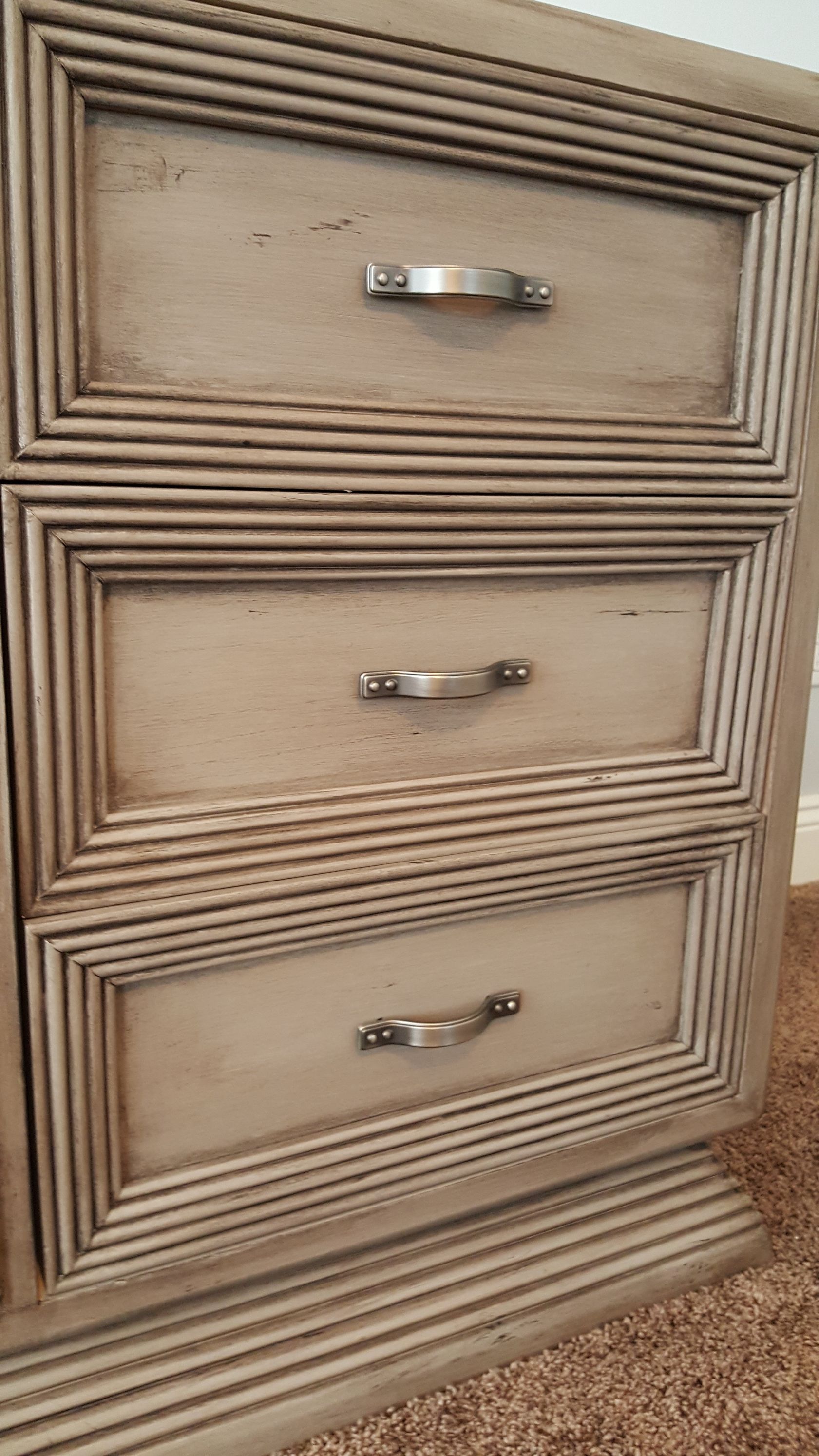 A close up of three drawers on a dresser. update old furniture